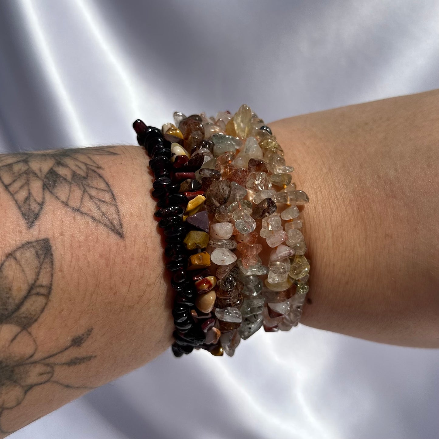 Red chip bracelet stack