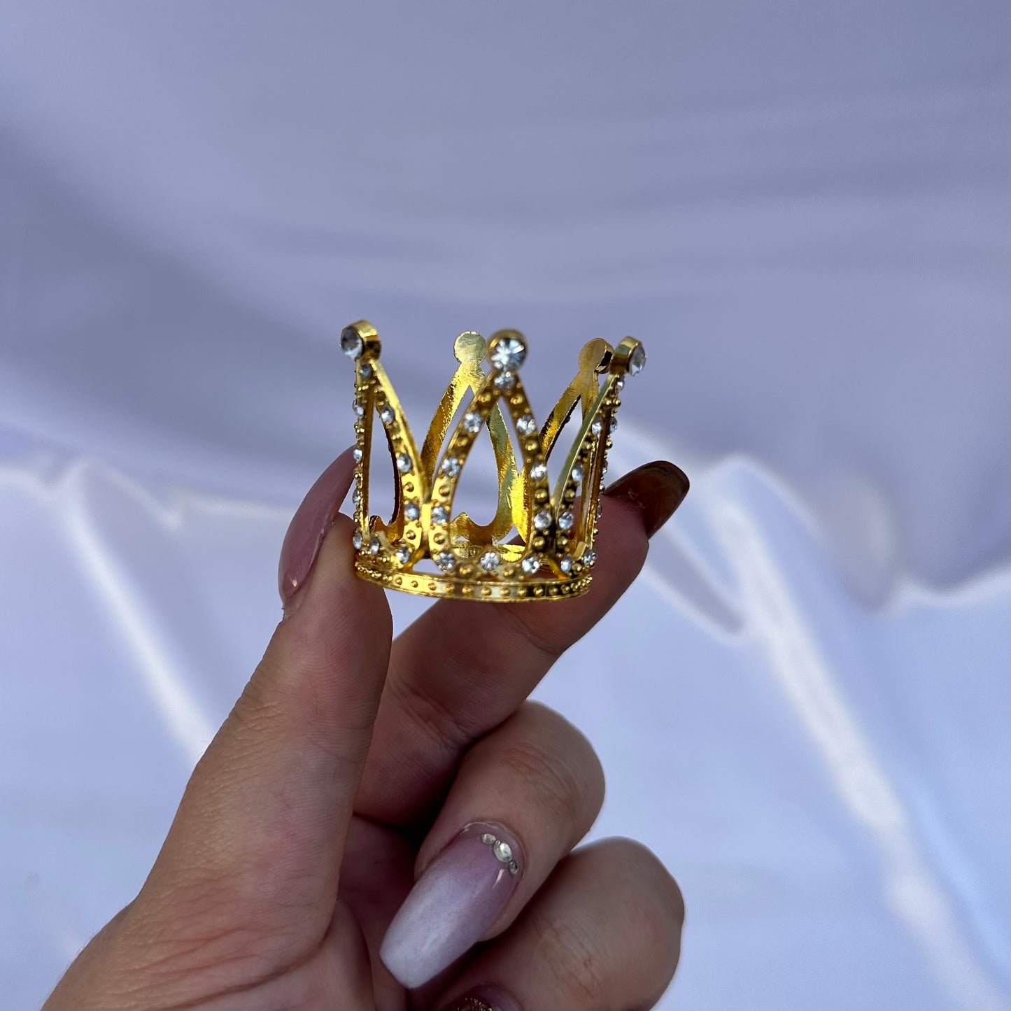 Assorted crown sphere stands