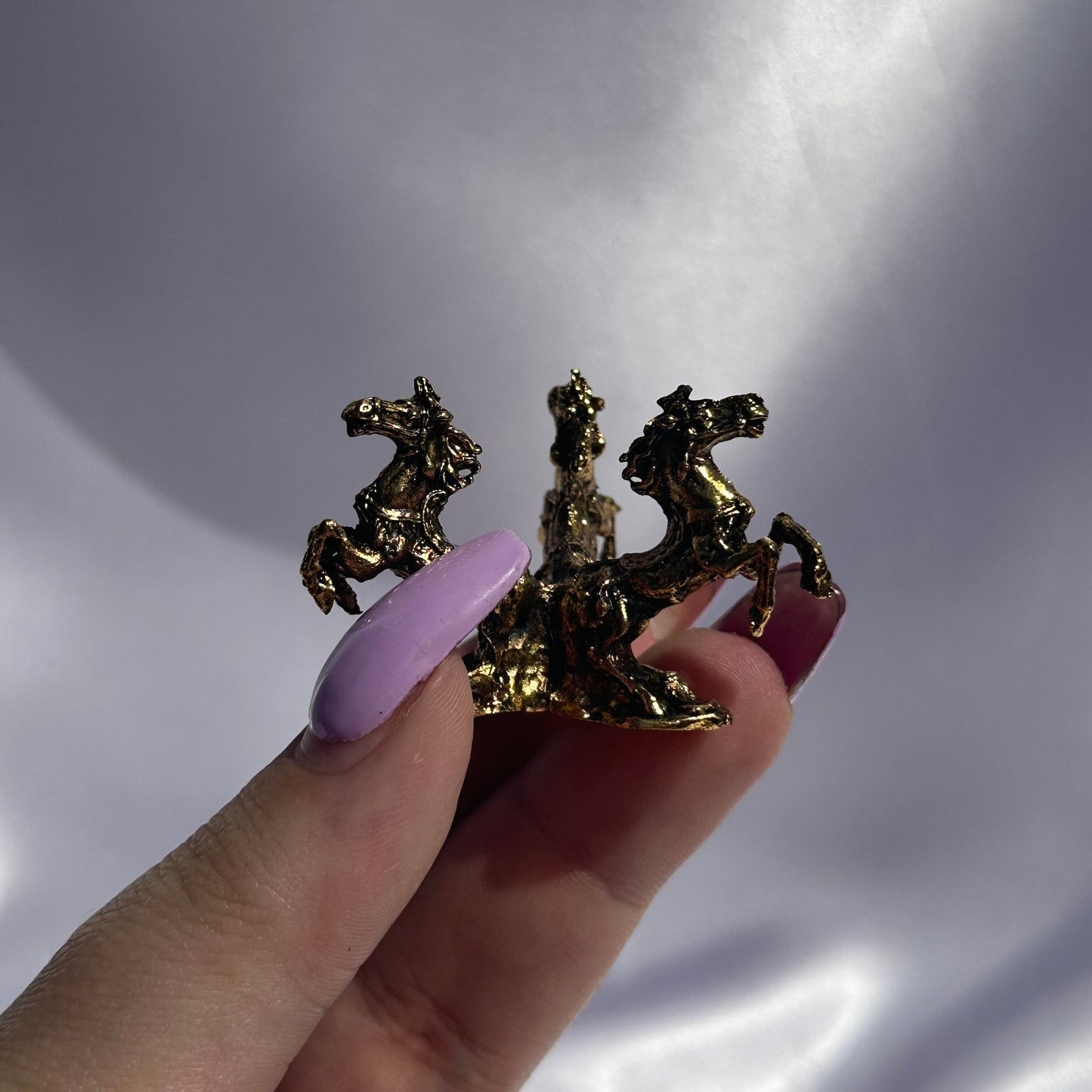 Assorted horse carousel sphere stands