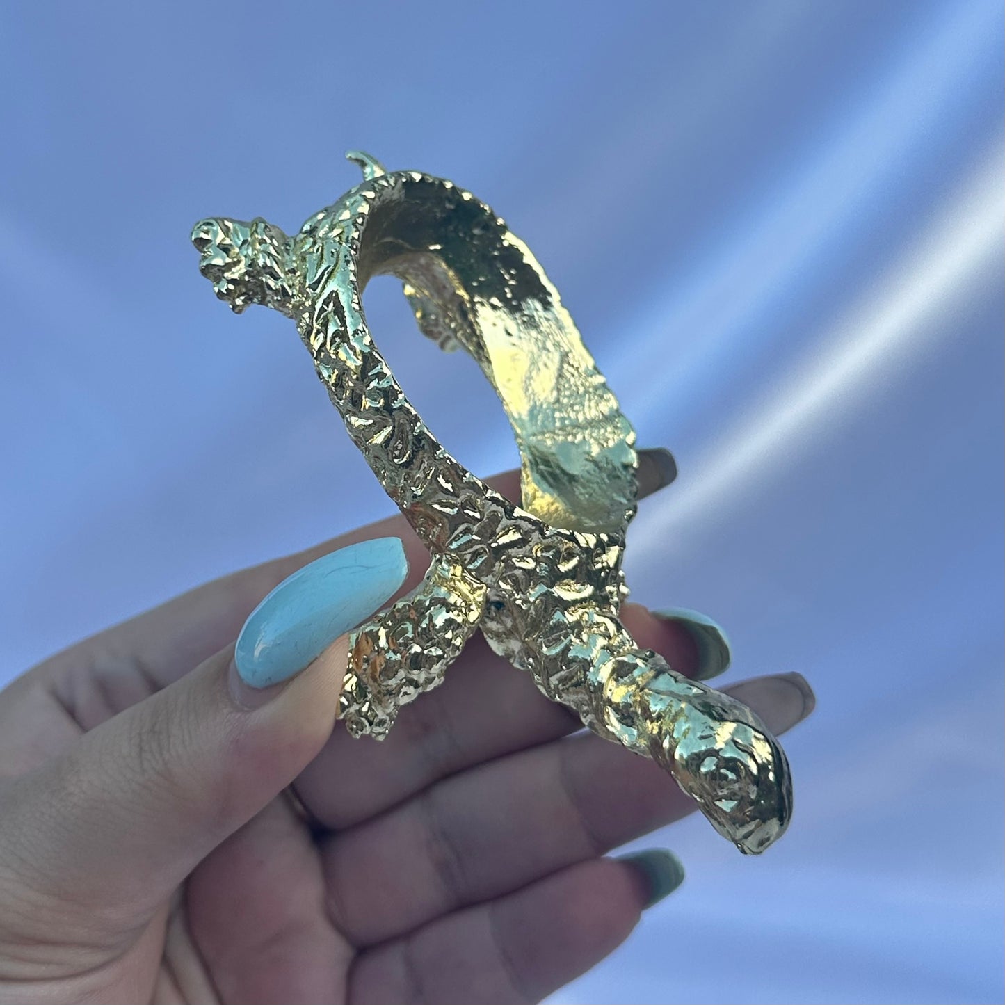 Gold metal turtle sphere stand