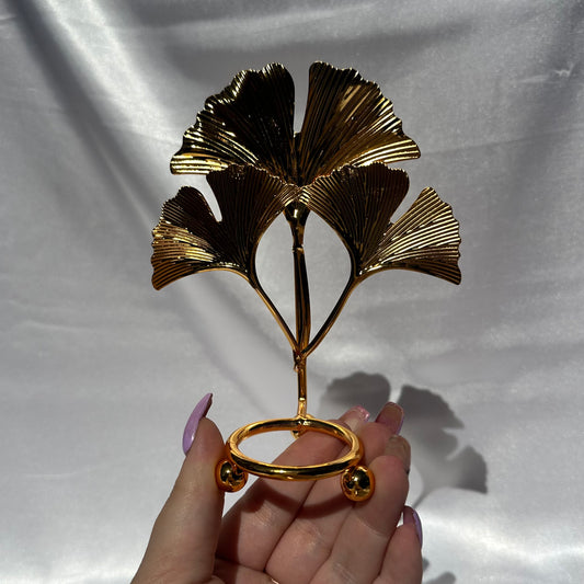 Gold fan leaf sphere stand