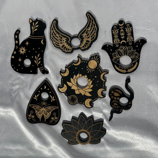 Assorted black wood sphere stands