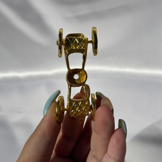 Gold carriage sphere stand