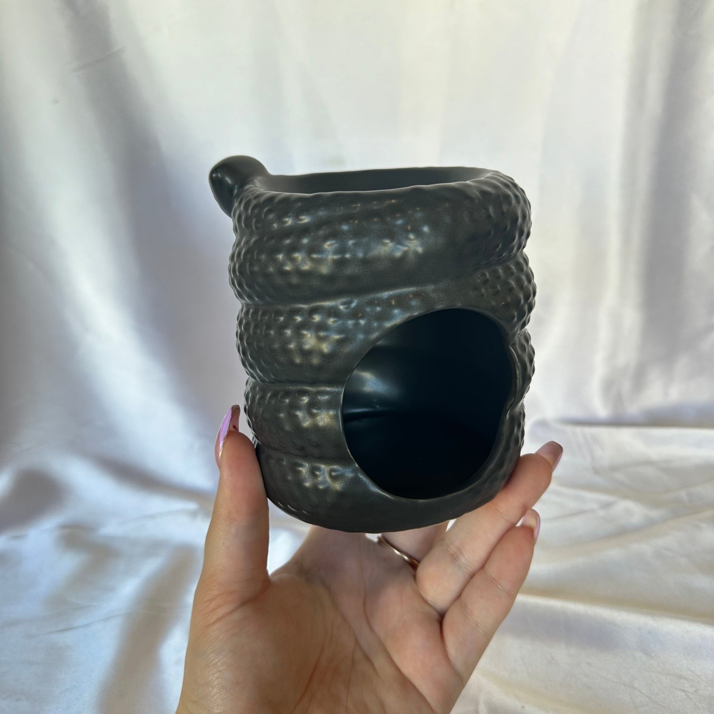 Serpentine wax burner