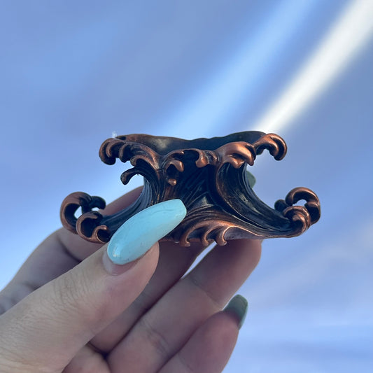 Ceramic wave sphere stand