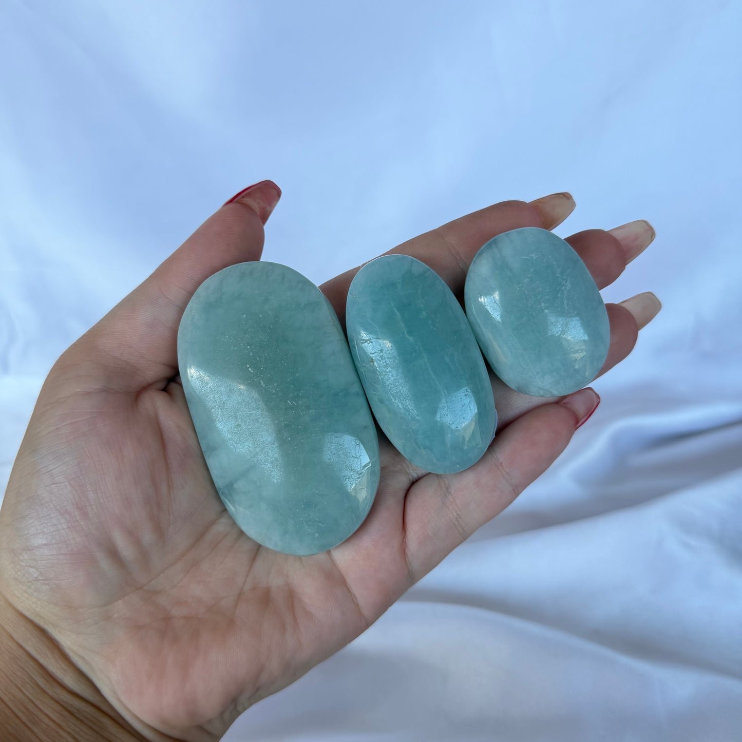 Aquamarine palm stone