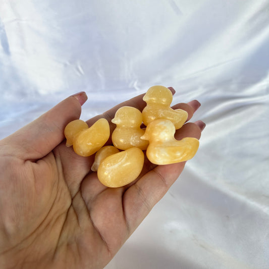 Small orange calcite duck