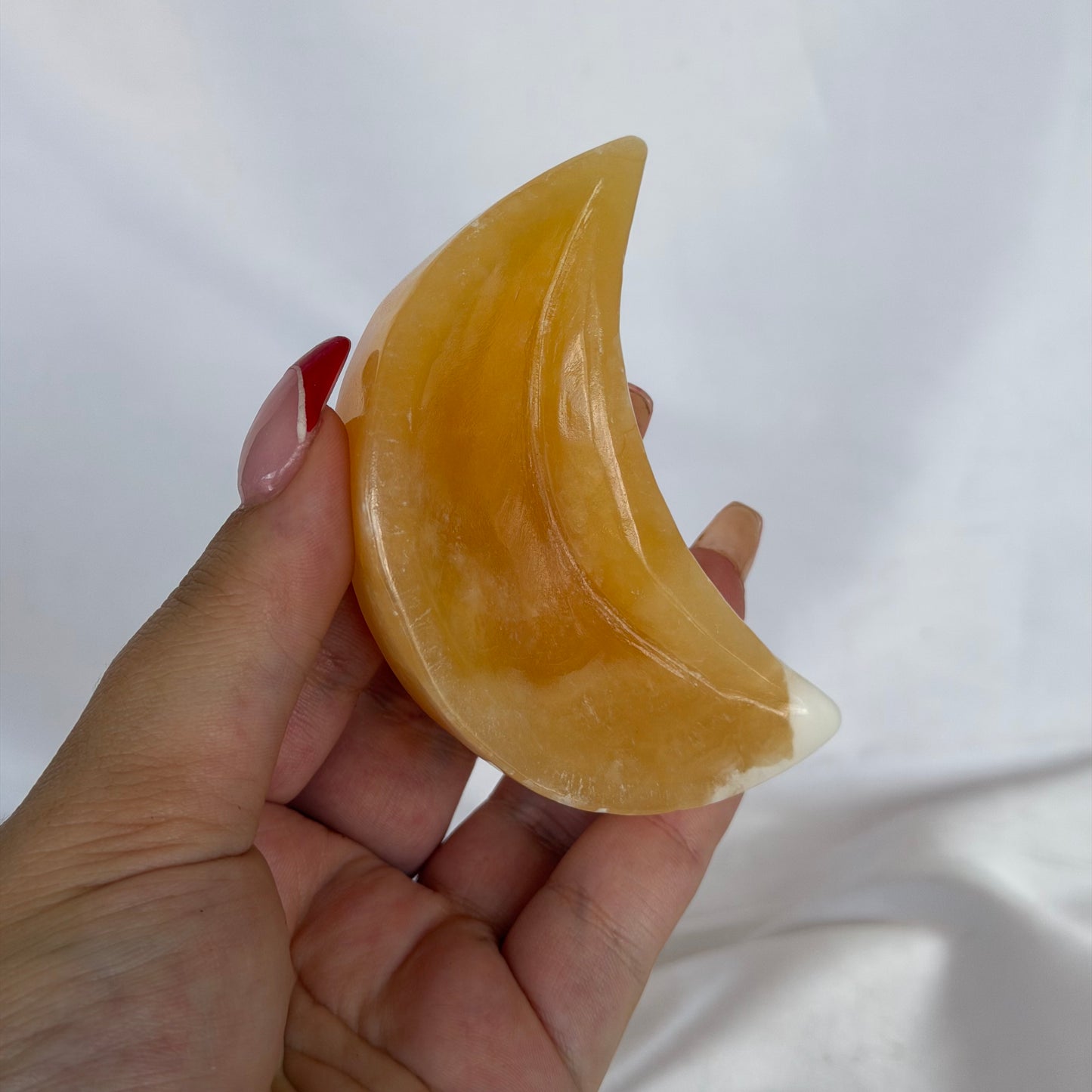 Orange calcite moon bowl