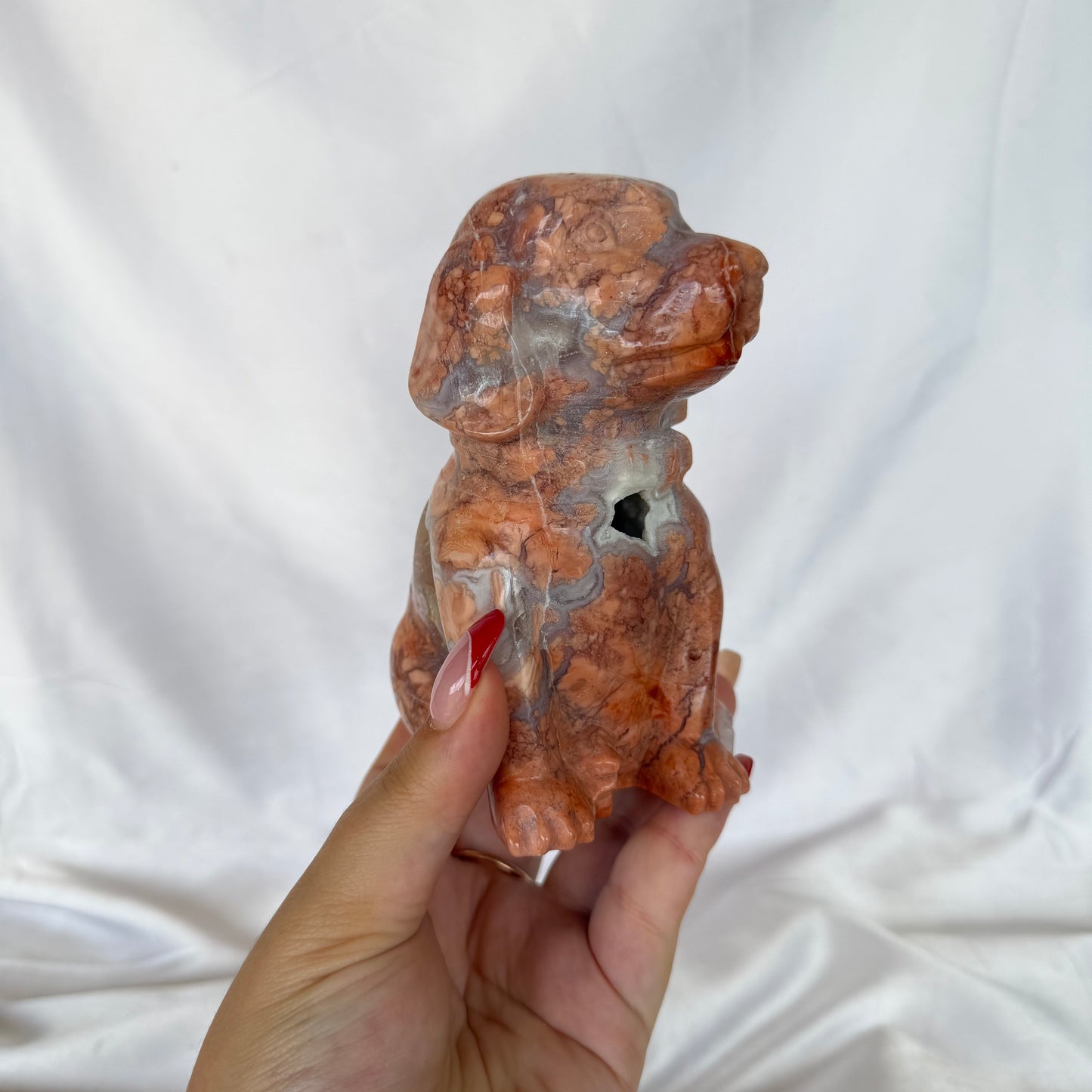 Petal agate dog carving