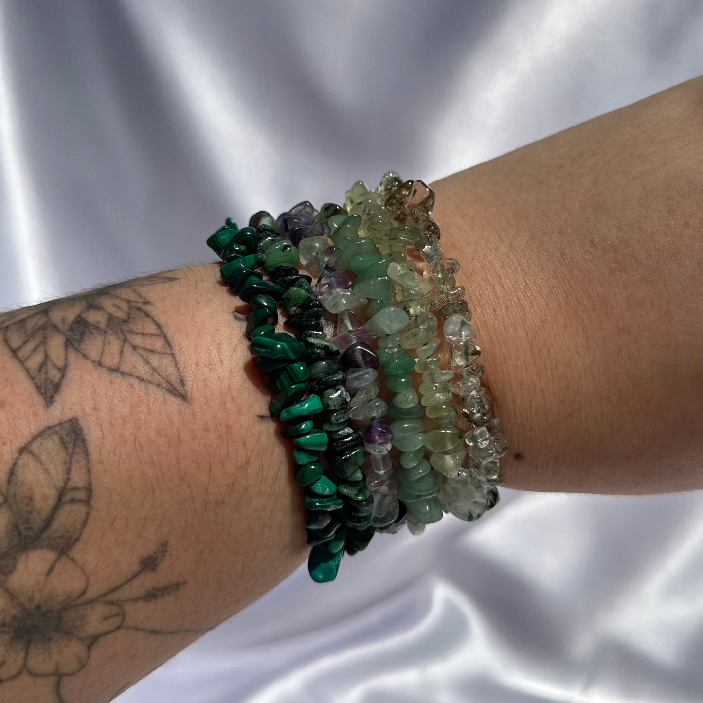 Green chip bracelet stack