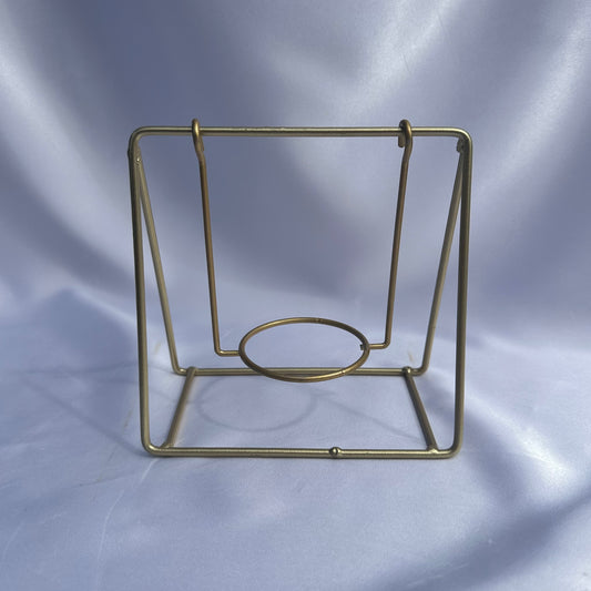 Gold swing sphere stand